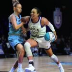 Napheesa Collier (24) of the Lunar Owls drives toward the basket as Courtney Vandersloot (25) of the Mist defends during the first half of the Unrivaled women’s professional 3v3 basketball league at Wayfair Arena