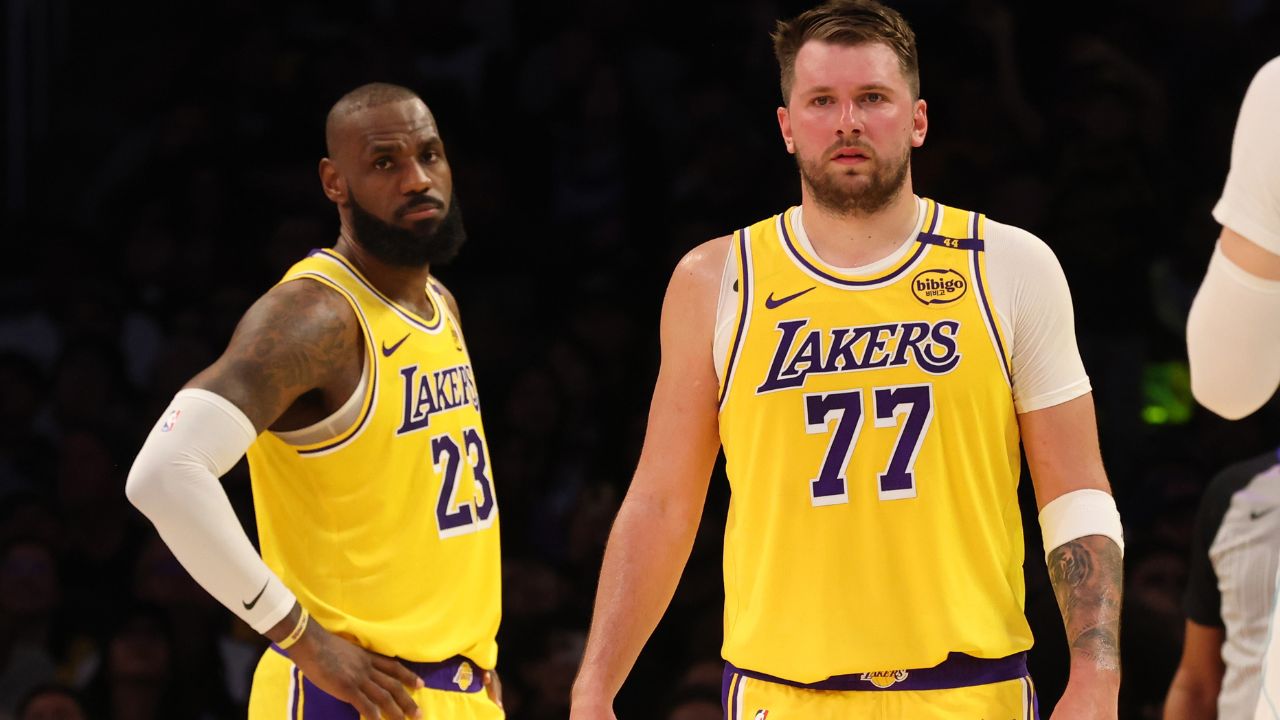 Los Angeles Lakers forward LeBron James (23) and guard Luka Doncic (77) during the second quarter against the Charlotte Hornets at Crypto.com Arena.