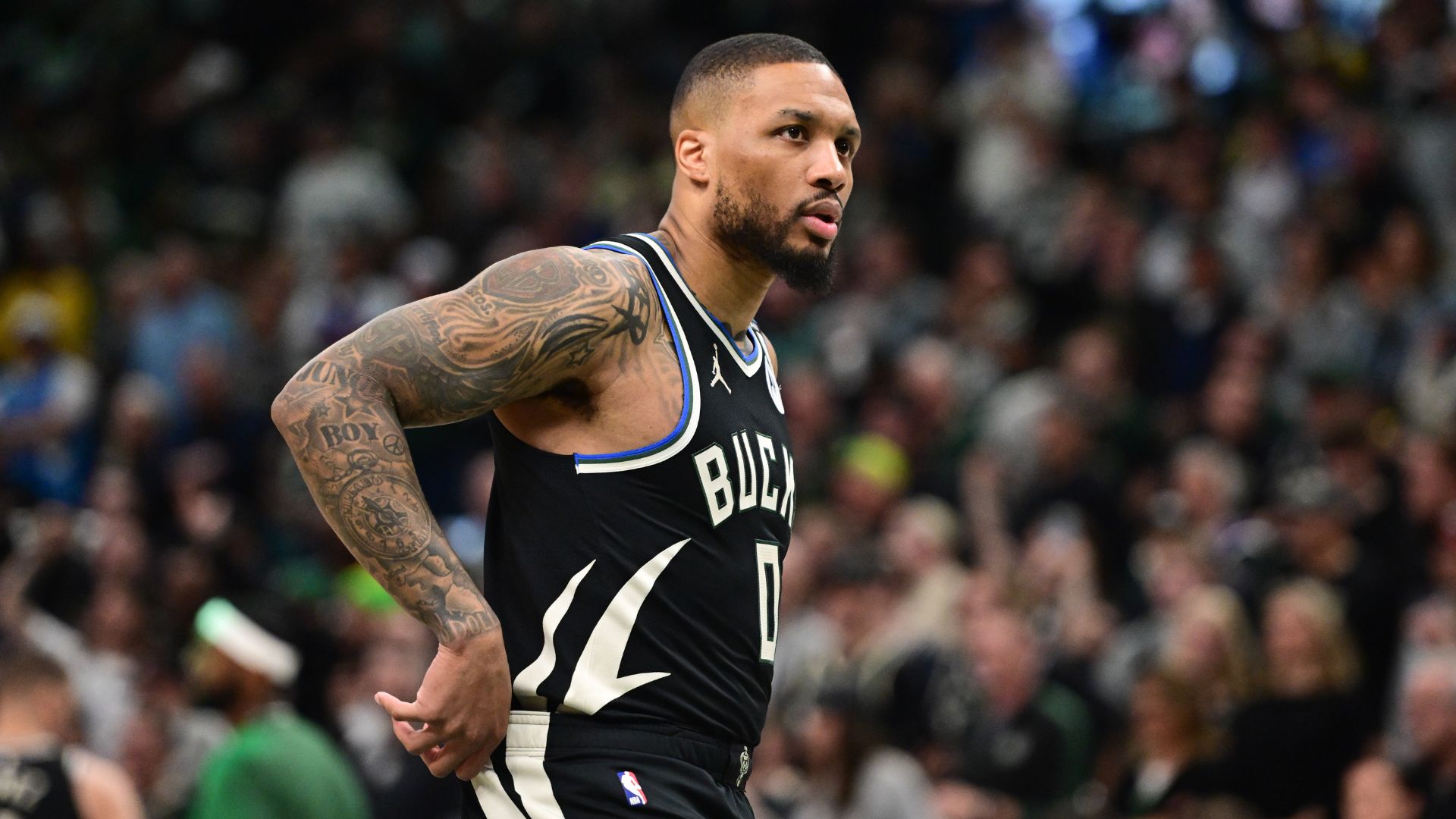 Apr 27, 2025; Milwaukee, Wisconsin, USA; Milwaukee Bucks guard Damian Lillard (0) looks on in the first quarter during game four against the Indiana Pacers of first round for the 2024 NBA Playoffs at Fiserv Forum. Lillard left the game early in the in the first quarter with an injury