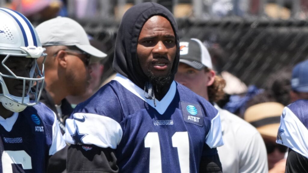 Jul 27, 2025; Oxnard, CA, USA; Dallas Cowboys safety Donovan Wilson (6), defensive end Micah Parsons (11) and safety Malik Hooker (28) watch from the sidelines at training camp at the River Ridge Fields.