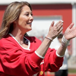 Randi Martin, mother of Kansas City Chiefs quarterback Patrick Mahomes, cheers on kids participating in the quarterback challenge during Field Fest on April 23, 2025, at City Stadium in Green Bay, Wis. The event was organized by the city of Green Bay and Greater Green Bay YMCA to celebrate NFL draft week.