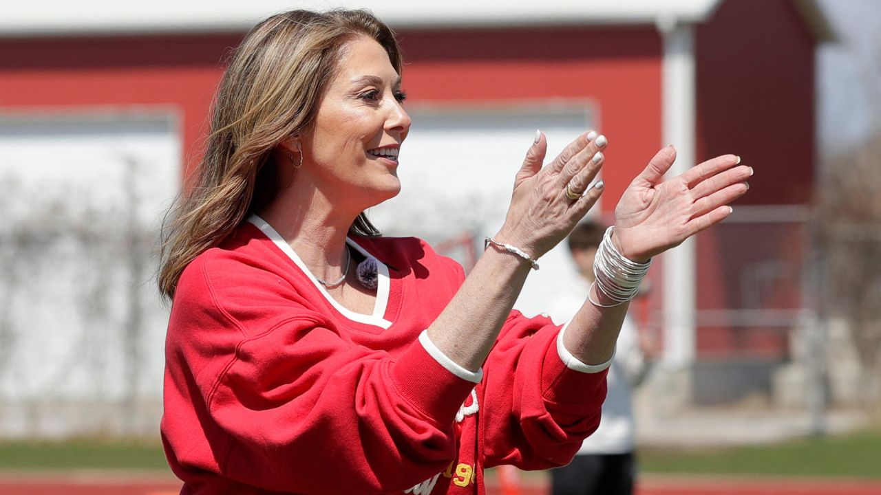 Randi Martin, mother of Kansas City Chiefs quarterback Patrick Mahomes, cheers on kids participating in the quarterback challenge during Field Fest on April 23, 2025, at City Stadium in Green Bay, Wis. The event was organized by the city of Green Bay and Greater Green Bay YMCA to celebrate NFL draft week.
