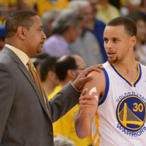 Golden State Warriors head coach Mark Jackson (left) talks to guard Stephen Curry (30) against the Los Angeles Clippers during the fourth quarter in game six of the first round of the 2014 NBA Playoffs at Oracle Arena. The Warriors defeated the Clippers 100-99.