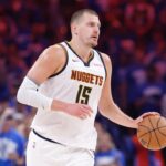 Denver Nuggets center Nikola Jokic (15) dribbles down the court against the Oklahoma City Thunder in the second quarter during game seven of the second round for the 2025 NBA Playoffs at Paycom Center.