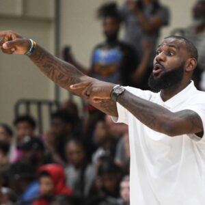 NBA star LeBron James coaches Strive for Greatness during the Strive for Greatness and Mokan Elite basketball game at the fourth day of the Nike Peach Jam at Riverview Park Activities Center.