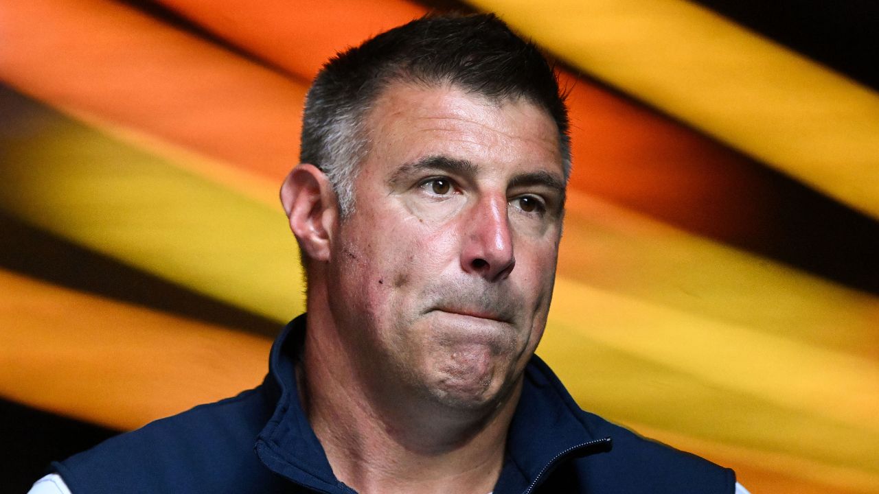 New England Patriots head coach Mike Vrabel walks onto the field before a game against the Washington Commanders at Gillette Stadium.