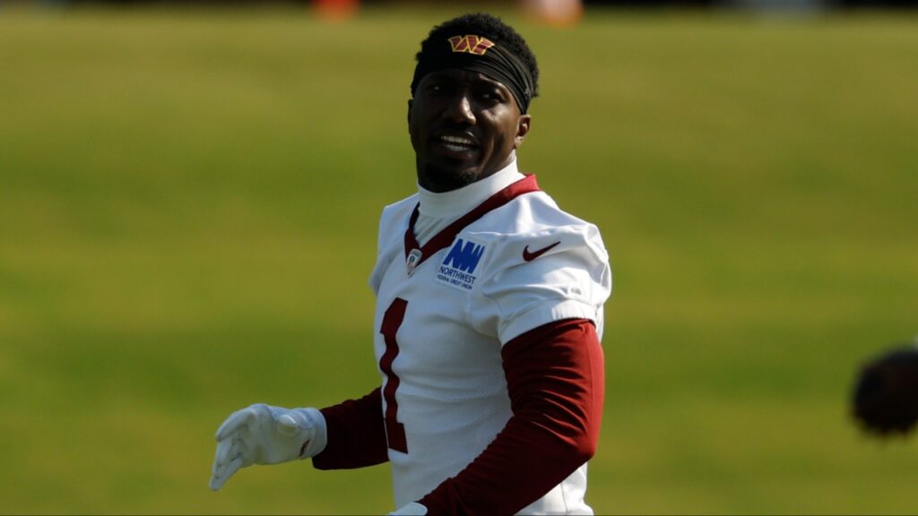 Washington Commanders wide receiver Deebo Samuel Sr. (1) stands on the field during warmup prior to practice on day two of training camp at OrthoVirginia Training Center at Commanders Park.