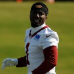Washington Commanders wide receiver Deebo Samuel Sr. (1) stands on the field during warmup prior to practice on day two of training camp at OrthoVirginia Training Center at Commanders Park.