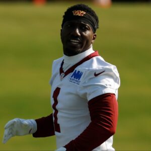 Washington Commanders wide receiver Deebo Samuel Sr. (1) stands on the field during warmup prior to practice on day two of training camp at OrthoVirginia Training Center at Commanders Park.