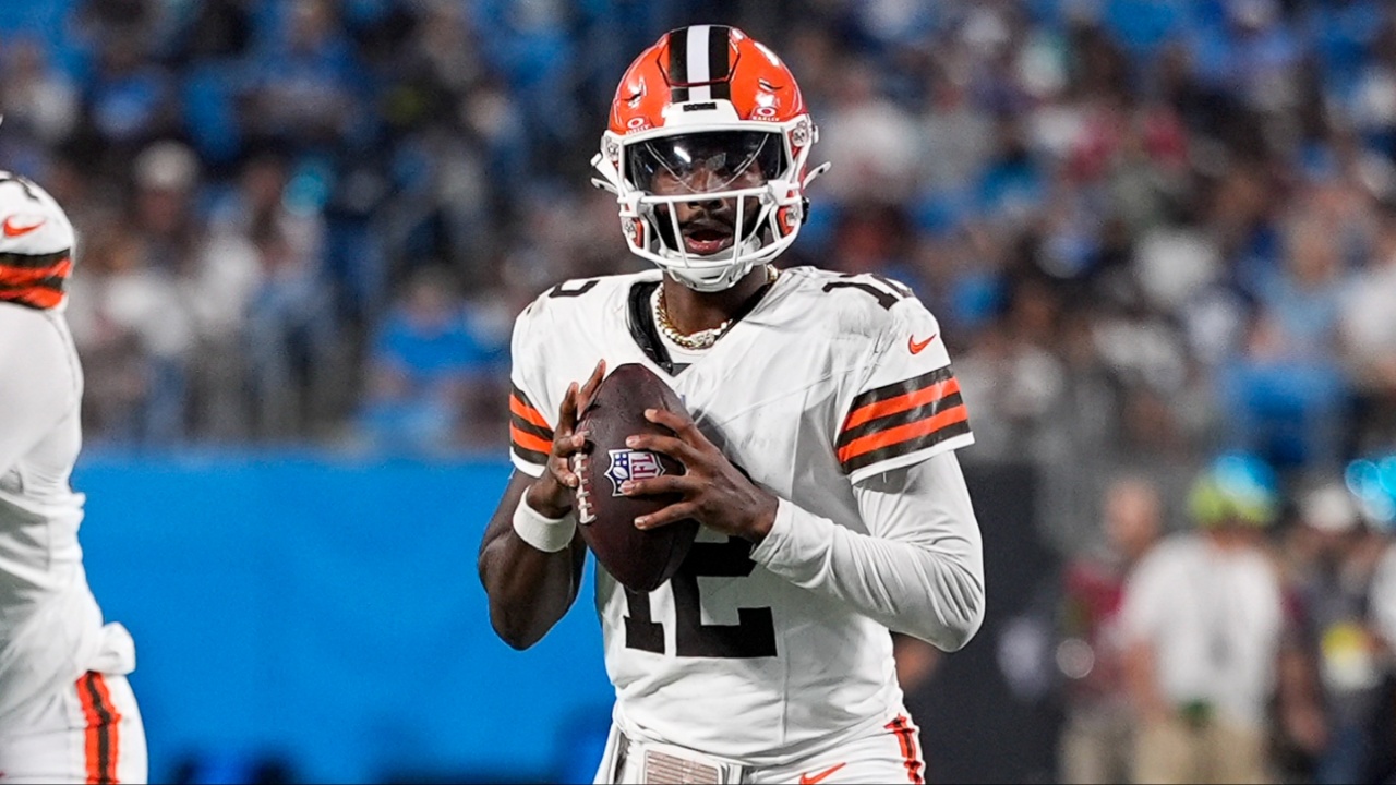Cleveland Browns quarterback Shedeur Sanders (12) looks downfield for a receiver during the second half against the Carolina Panthers at Bank of America Stadium.