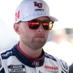 NASCAR Cup Series driver William Byron (24) stands in his pit box prior to practice for the Cook Out Southern 500 at Darlington Raceway.
