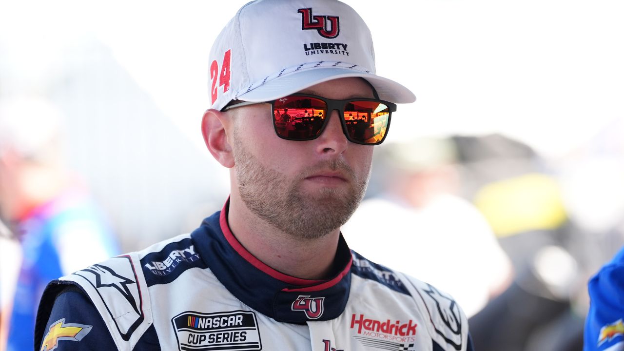 NASCAR Cup Series driver William Byron (24) stands in his pit box prior to practice for the Cook Out Southern 500 at Darlington Raceway.