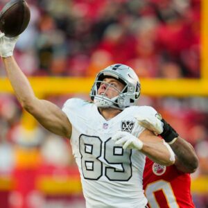 Las Vegas Raiders tight end Brock Bowers (89) is unable to make a catch against Kansas City Chiefs safety Justin Reid (20) during the second half at GEHA Field at Arrowhead Stadium.