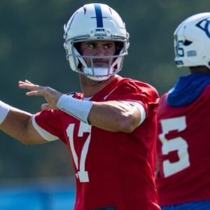 Indianapolis Colts quarterbacks Anthony Richardson Sr. (5) and Daniel Jones (17) pass Wednesday, July 23, 2025, during the first day of training camp held at Grand Park in Westfield.