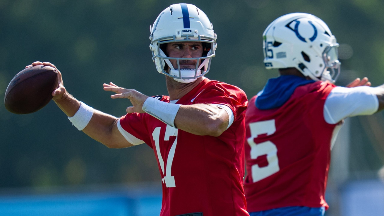 Indianapolis Colts quarterbacks Anthony Richardson Sr. (5) and Daniel Jones (17) pass Wednesday, July 23, 2025, during the first day of training camp held at Grand Park in Westfield.