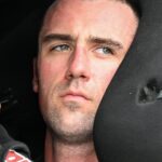 NASCAR Cup Series driver Austin Cindric (2) sits in his car Saturday, July 26, 2025, during qualifying for the Brickyard 400 at Indianapolis Motor Speedway.