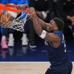Minnesota Timberwolves guard Anthony Edwards (5) dunks the ball against the Oklahoma City Thunder during the first half in game three of the western conference finals for the 2025 NBA Playoffs at Target Center.