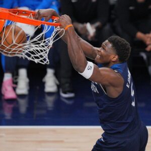 Minnesota Timberwolves guard Anthony Edwards (5) dunks the ball against the Oklahoma City Thunder during the first half in game three of the western conference finals for the 2025 NBA Playoffs at Target Center.