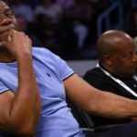 Magic Johnson attends a WNBA game between the Los Angeles Sparks and the Minnesota Lynx at Crypto.com Arena.