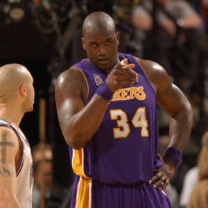 Shaquille O Neal points to the other end of the court, where fouls were not called, when Mike Bibby complains that a foul wasn t called on Bibby s drive to the basket.in game one of the NBA Basketball Herren USA Western Conference Finals between the Sacramento Kings and the Los Angeles Lakers