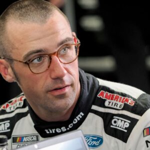 NASCAR Cup Series driver Austin Cindric (2) sits in his garage bay Friday, July 25, 2025, ahead of practice at Indianapolis Motor Speedway in preparation for the Brickyard 400. Cup practice was cancelled due weather in the area.