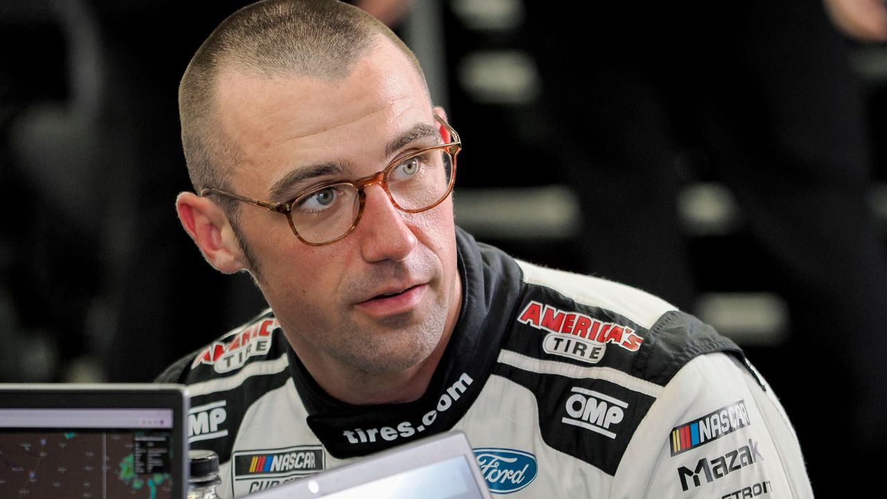 NASCAR Cup Series driver Austin Cindric (2) sits in his garage bay Friday, July 25, 2025, ahead of practice at Indianapolis Motor Speedway in preparation for the Brickyard 400. Cup practice was cancelled due weather in the area.