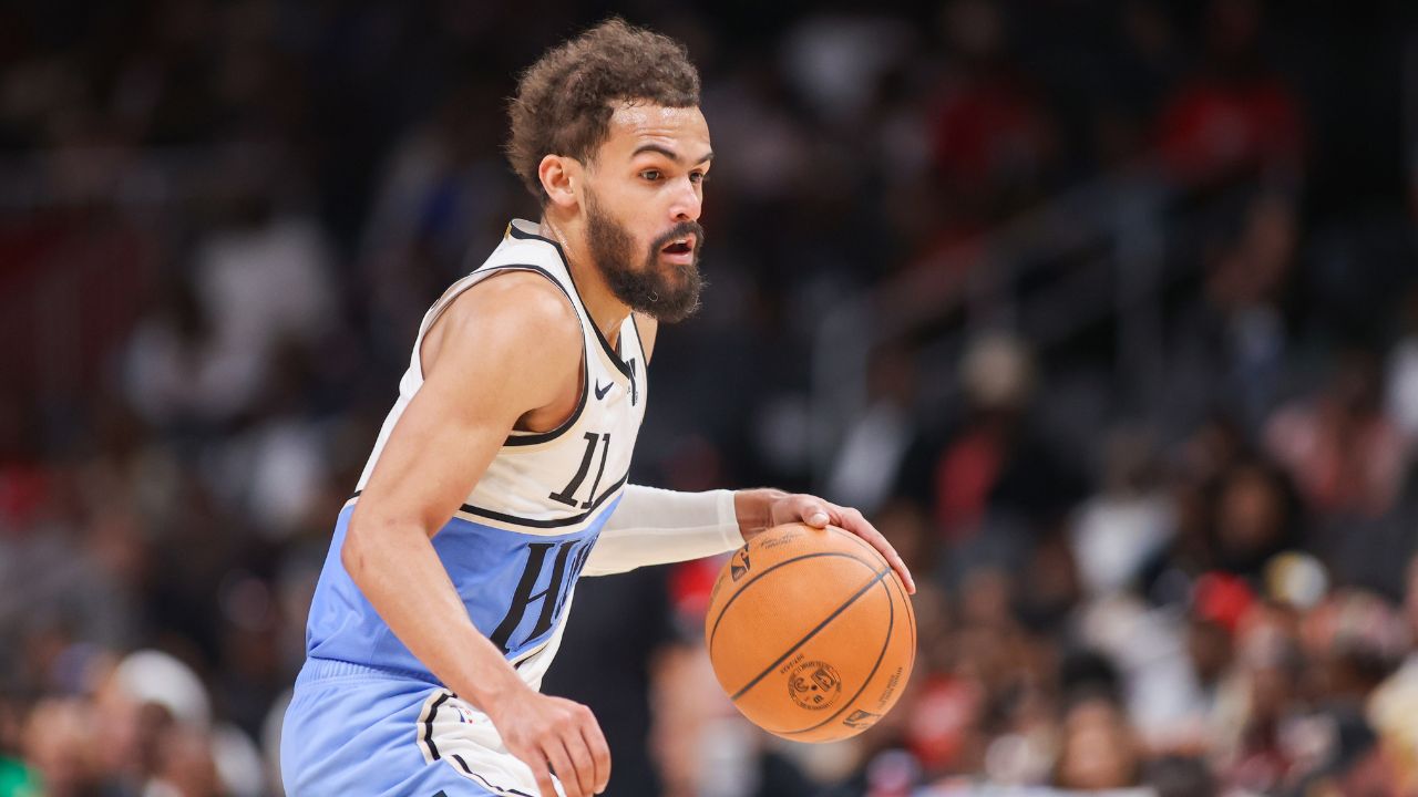 Atlanta Hawks guard Trae Young (11) drives to the basket against the Philadelphia 76ers in the third quarter at State Farm Arena.
