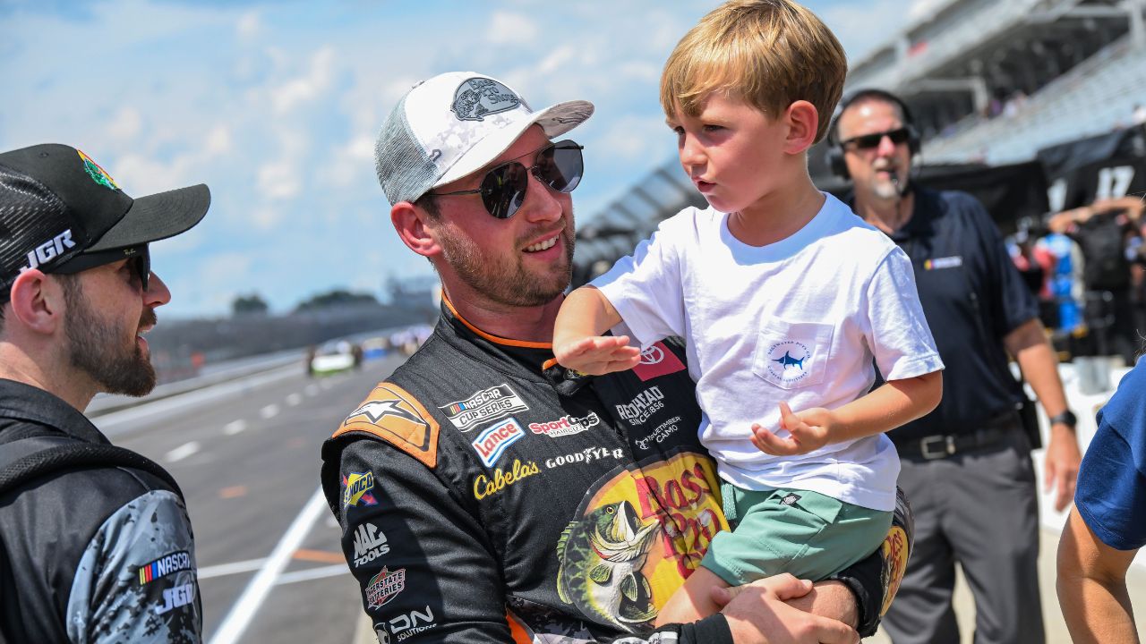 NASCAR Cup Series driver Chase Briscoe (19) hold this son, Brooks Wayne Cunningham Briscoe on Saturday, July 26, 2025, during qualifying for the Brickyard 400 at Indianapolis Motor Speedway.