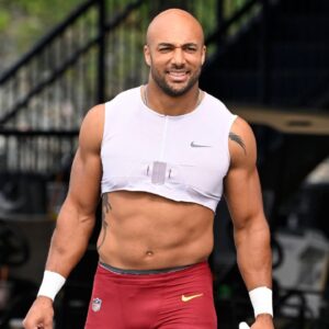 Washington Commanders running back Austin Ekeler (30) arrives at training camp at Gillette Stadium.