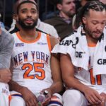 Jan 17, 2025; New York, New York, USA; New York Knicks forwards Jacob Toppin (00), Mikal Bridges (25) and guard Jalen Brunson (11) at Madison Square Garden.