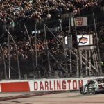 NASCAR Cup Series driver Chase Briscoe (14) crosses the start/finish line to win the Cook Out Southern 500 at Darlington Raceway.