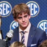 Texas Longhorns quarterback Arch Manning answers questions from the media during SEC Media Days at Omni Atlanta Hotel.