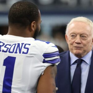 Jan 16, 2022; Arlington, Texas, USA; Dallas Cowboys outside linebacker Micah Parsons (11) meets with owner Jerry Jones (center) and NFL commissioner Roger Goodell (right) prior to the NFC Wild Card playoff football game against the San Francisco 49ers at AT&T Stadium.