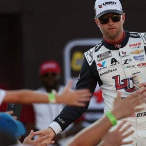 NASCAR Cup Series driver William Byron (24) shakes hands with fans during driver introductions prior to the NASCAR Cup Series Cook Out 400 at Richmond Raceway.