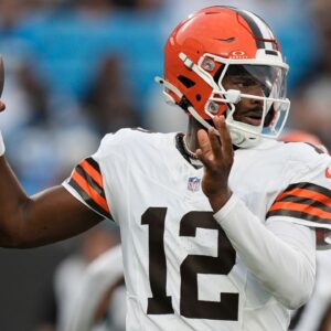 Aug 8, 2025; Charlotte, North Carolina, USA; Cleveland Browns quarterback Shedeur Sanders (12) looks to pass against the Carolina Panthers during the first quarter at Bank of America Stadium.