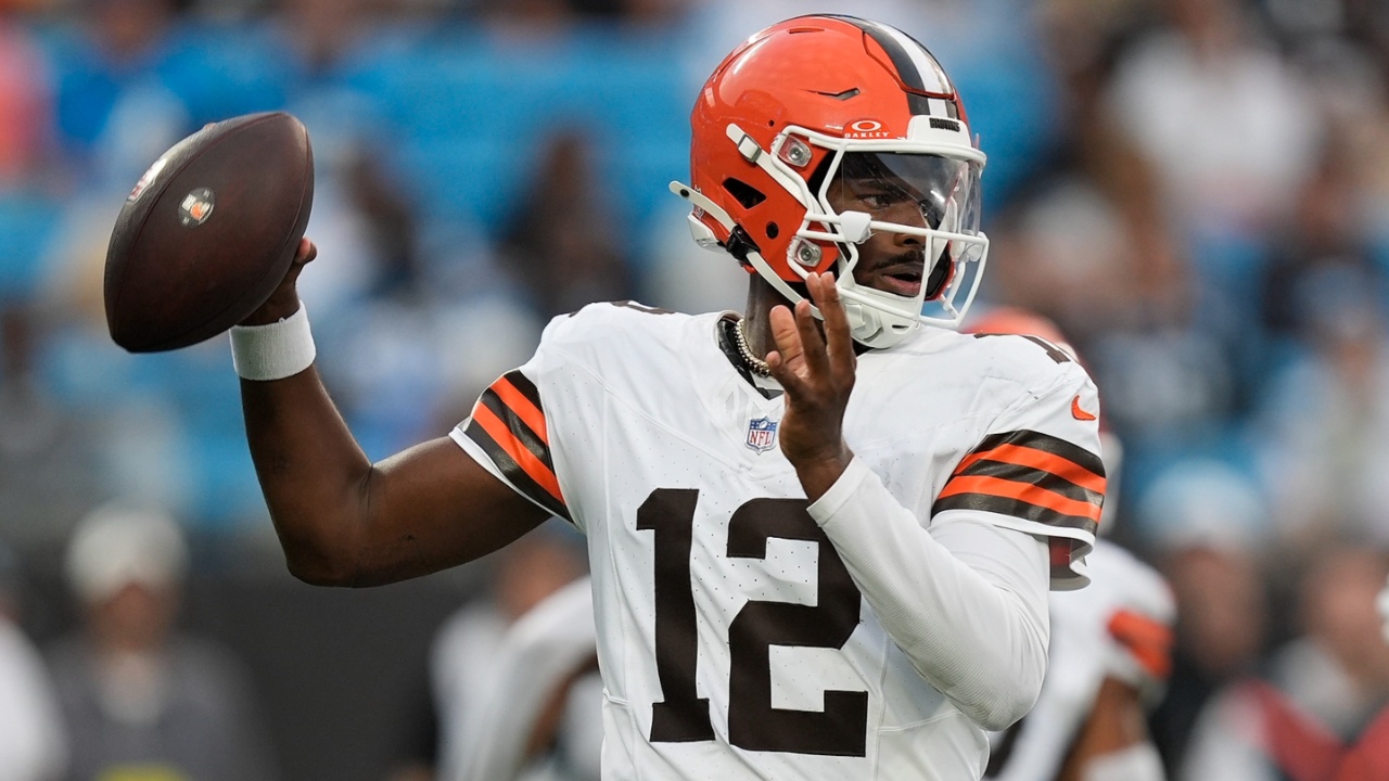 Aug 8, 2025; Charlotte, North Carolina, USA; Cleveland Browns quarterback Shedeur Sanders (12) looks to pass against the Carolina Panthers during the first quarter at Bank of America Stadium.