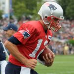 Jul 27, 2017; Foxborough, MA, USA; New England Patriots quarterback Tom Brady (12) runs through a drill during training camp at Gillette Stadium.