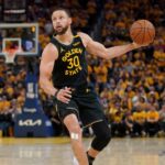 Golden State Warriors guard Stephen Curry (30) holds onto the ball against the Houston Rockets in the third quarter of game six of the first round for the 2025 NBA Playoffs at Chase Center.
