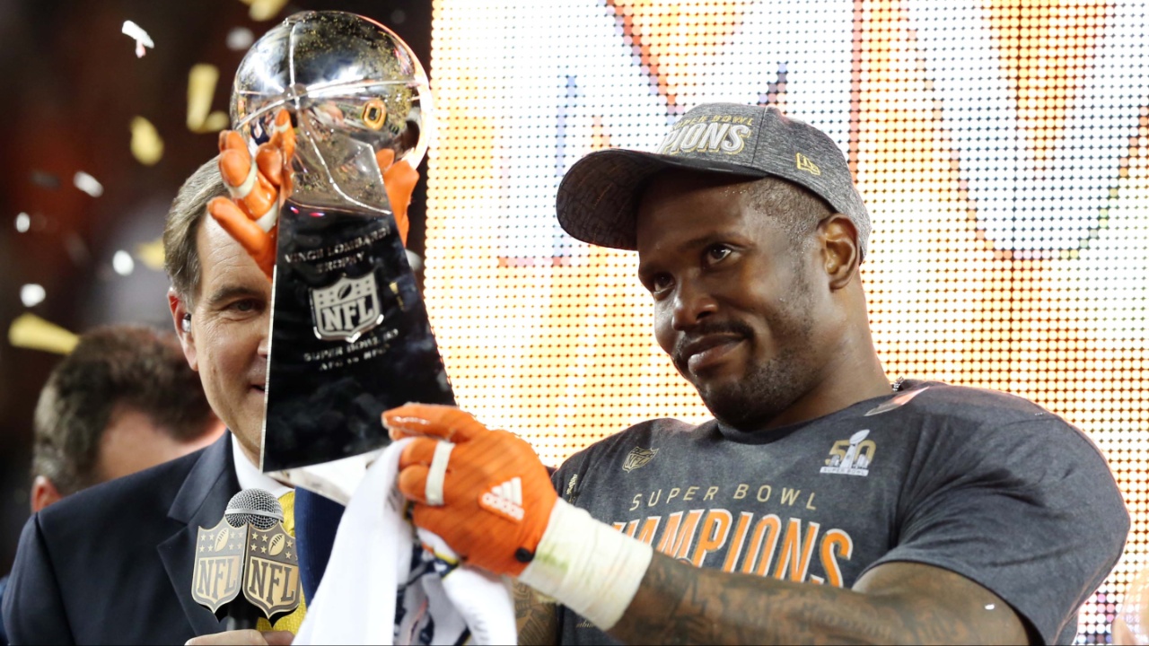 Denver Broncos outside linebacker Von Miller (58) celebrates with the Vince Lombardi Trophy after being named the Super Bowl MVP after beating the Carolina Panthers in Super Bowl 50 at Levi's Stadium.