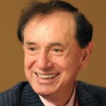 Forrest Lucas, President and CEO of Lucas Oil Products, takes a break before his luncheon at the International Motorsports Industry Show at the Indiana Convention Center.