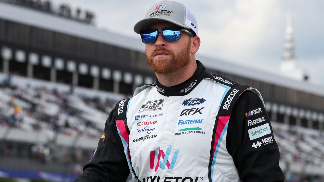 NASCAR Cup Series driver Chris Buescher walks on pit road during practice and qualifying for The Great American Getaway 400 at Pocono Raceway.
