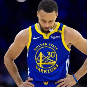 Mar 1, 2025; Philadelphia, Pennsylvania, USA; Golden State Warriors guard Stephen Curry (30) looks on against the Philadelphia 76ers during the second quarter at Wells Fargo Center.