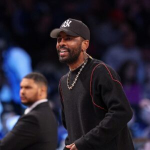 Dallas Mavericks guard Kyrie Irving (11) looks on during the first quarter against the Brooklyn Nets at Barclays Center.