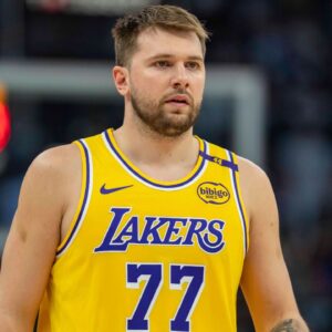 Los Angeles Lakers guard Luka Doncic (77) looks on against the Minnesota Timberwolves in the first half during game three of first round for the 2024 NBA Playoffs at Target Center.