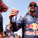 Shane Van Gisbergen (88) fist bumps a fan before the NASCAR Cup Series Iowa Corn 350 on Aug. 3, 2025, at Iowa Speedway in Newton, Iowa.