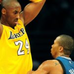 Los Angeles Lakers shooting guard Kobe Bryant (24) controls the ball against the defense of Minnesota Timberwolves point guard Sebastian Telfair (3) during the first half at the Staples Center.