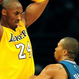 Los Angeles Lakers shooting guard Kobe Bryant (24) controls the ball against the defense of Minnesota Timberwolves point guard Sebastian Telfair (3) during the first half at the Staples Center.