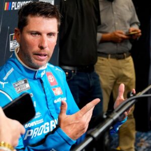 Denny Hamlin answers questions from the media during NASCAR Cup Series Playoff Media Day at Charlotte Convention Center.