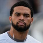 Chicago Bears quarterback Caleb Williams (18) warms up before a game against the Buffalo Bills at Soldier Field.