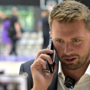 Caption: Aug 2, 2025; El Segundo, CA, USA; Los Angeles Lakers Luka Doncic (77) is interviewed by ESPN LA radio following a press conference announcing the signing of a 3-year, $165 million contract extension at UCLA Health Training Center.